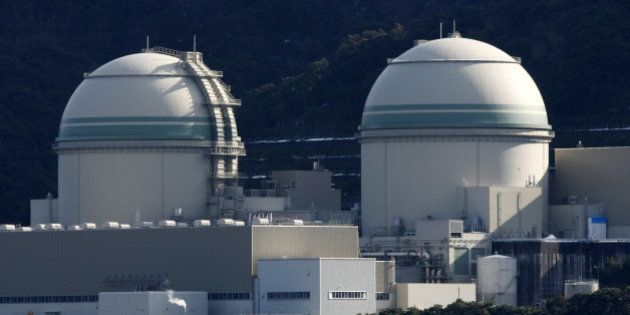 The No. 3, left, and No. 4 reactor buildings stand at Kansai Electric Power Co.'s Takahama nuclear power station in Takahama Town, Fukui Prefecture, Japan, on Monday, Feb. 20, 2012. Kansai Electric Power Co., which relied on nuclear operations to generate about 45 percent of the western region of Kansai's electricity before the quake, said the company is scheduled to shutdown the No. 3 reactor at the plant for regular maintenance tonight. Photographer: Tomohiro Ohsumi/Bloomberg via Getty Images