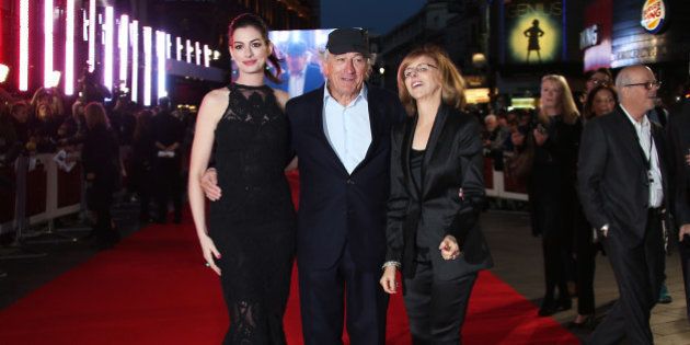 Anne Hathaway, Robert De Niro and director Nancy Meyers pose for photographers upon arrival at the European premiere of the film 'The Intern' in London, Sunday, Sept. 27, 2015. (Photo by Joel Ryan/Invision/AP)