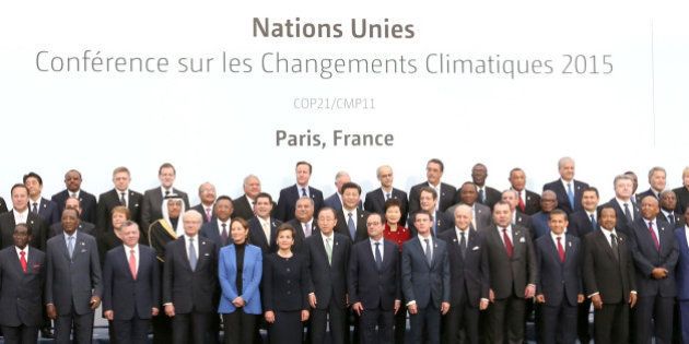 PARIS, Nov. 30, 2015-- Chinese President Xi Jinping, eighth left in second row, poses for a group photo with other participants during the United Nations climate change conference in Paris, France, Nov. 30, 2015. (Xinhua/Ma Zhancheng via Getty Images)