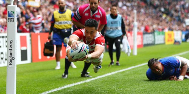 MILTON KEYNES, ENGLAND - OCTOBER 03: Akihito Yamada of Japan scores his teams second try during the 2015 Rugby World Cup Pool B match between Samoa and Japan at Stadium mk on October 3, 2015 in Milton Keynes, United Kingdom. (Photo by Michael Steele/Getty Images)
