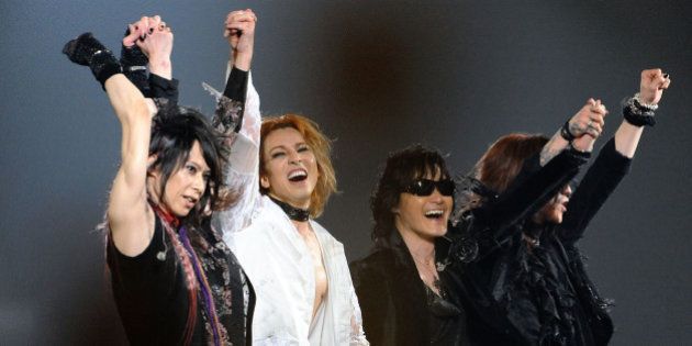 TOKYO - MAY 03: Musicians Heath, Yoshiki, Toshi and Sugizo perform during the X Japan World Tour Live in Tokyo - the Eighteenth Night at Tokyo Dome on May 3, 2009 in Tokyo, Japan. (Photo by Jun Sato/ WireImage)