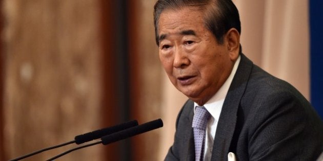 Former Japanese parliament member Shintaro Ishihara speaks to the media at the national press club in Tokyo on December 16, 2014. Ishihara, who has made a decades-long career out of baiting China and offending Japan's liberals, announced his retirement from political life on December 16. AFP PHOTO / Yoshikazu TSUNO (Photo credit should read YOSHIKAZU TSUNO/AFP/Getty Images)