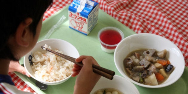 JAPAN - JANUARY 26: A school girl have school lunch at Senzoku Elementary School in Tokyo, Japan, on Monday, Jan. 26, 2009. (Photo by Toshiyuki Aizawa/Bloomberg via Getty Images)