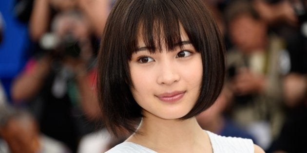 Japanese actress Suzu Hirose poses during a photocall for the film 'Umimachi Diary' (Our Little Sister) during the 68th Cannes Film Festival in Cannes, southeastern France, on May 14, 2015. AFP PHOTO / LOIC VENANCE (Photo credit should read LOIC VENANCE/AFP/Getty Images)