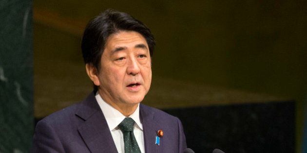 Prime Minister Shinzo Abe, of Japan, addresses the 2015 Sustainable Development Summit, Sunday, Sept. 27, 2015, at United Nations headquarters. (AP Photo/Craig Ruttle)