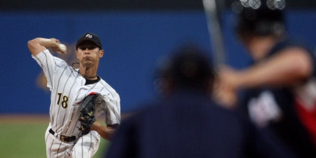 BEIJING - AUGUST 20: Yu Darvish of Japan pitches against the United States at the Wukesong Baseball Field during Day 12 of the Beijing 2008 Olympic Games on August 20, 2008 in Beijing, China. (Photo by Nick Laham/Getty Images)