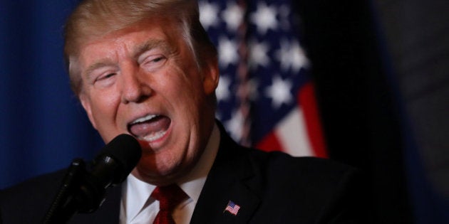 U.S. President Donald Trump delivers a statement about missile strikes on a Syrian airfield, at his Mar-a-Lago estate in West Palm Beach, Florida, U.S., April 6, 2017. REUTERS/Carlos Barria