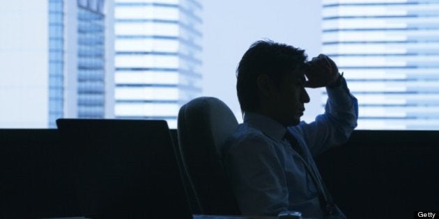 Businessman at table in conference room