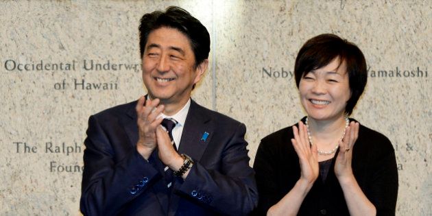 Japan's Prime Minister Shinzo Abe, left, and his wife Akie Abe attend a reception at the Japanese American National Museum Friday, May 1, 2015 in Los Angeles. (Kevork Djansezian/Pool Photo via AP)