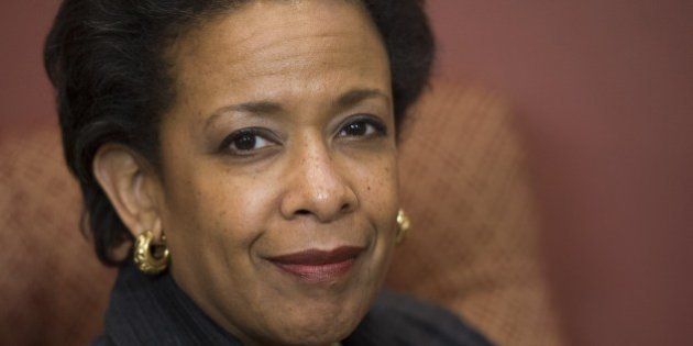 Loretta Lynch, nominee for US Attorney General, attends a meeting with US Senator Chuck Schumer, Democrat of New York, on Capitol Hill in Washington, DC, December 2, 2014. AFP PHOTO / Saul LOEB (Photo credit should read SAUL LOEB/AFP/Getty Images)