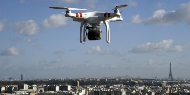 Illustrarion of a drone flying over Saint-Cloud near Paris on Febuary 27, 2015. One of three Al-Jazeera journalists arrested for flying a drone in Paris' Bois de Boulogne park on the western edge of the French capital, for the purposes of a television report, will appear in court next week after pleading guilty, a judicial source said on February 26, 2015. Flying drones over the capital is illegal under French law. AFP PHOTO / DOMINIQUE FAGET (Photo credit should read DOMINIQUE FAGET/AFP/Getty Images)