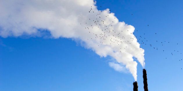 Smoke from chimneys against a blue sky Sweden.