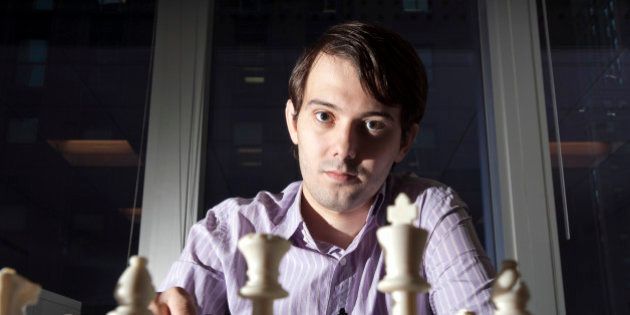 Martin Shkreli, chief investment officer of MSMB Capital Management, sits for a photograph behind a chess board in New York, U.S., on Wednesday, Aug. 10, 2011. MSMB made an unsolicited $378 million takeover bid for Amag Pharmaceuticals Inc. and said it will fire the drugmaker's top management if successful. Photographer: Paul Taggart/Bloomberg via Getty Images ***Local Caption ** Martin Shkreli