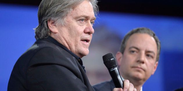 White House advisor Steve Bannon (L) makes remarks as White House Chief of Staff Reince Preibus listens during a discussion at the Conservative Political Action Conference (CPAC) at National Harbor, Maryland, February 23, 2017. / AFP / Mike Theiler (Photo credit should read MIKE THEILER/AFP/Getty Images)