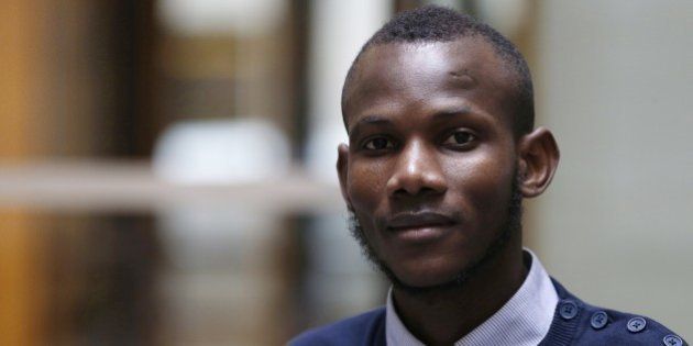 Malian Lassana Bathily, a Muslim employee who helped Jewish shoppers hide in a cold storage room from an islamist gunman during the January 9, 2015 attack, poses on January 15 in Paris. Four people were killed by jihadist Amedy Coulibaly in a hostage-taking drama at a kosher supermarket in Paris. AFP PHOTO / FRANCOIS GUILLOT (Photo credit should read FRANCOIS GUILLOT/AFP/Getty Images)