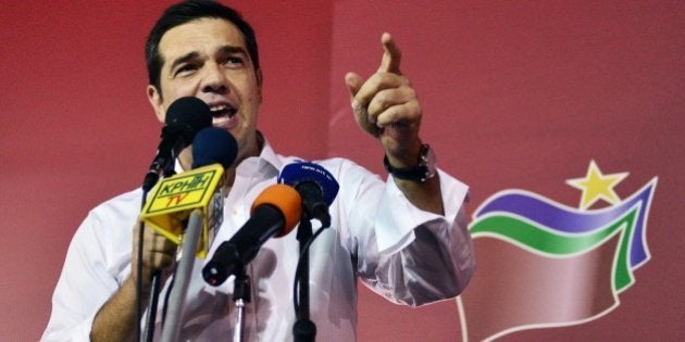 Syriza leader Alexis Tsipras speaks to supporters after his party's victory in the Greek general elections at his campaign headquarters in Athens on September 20, 2015. With over half of the votes counted, Tsipras' Syriza party won 35.54 percent of the vote against 28.07 percent for conservative New Democracy and is likely to again form a coalition government with the nationalist Independent Greeks party. AFP PHOTO/ LOUISA GOULIAMAKI (Photo credit should read LOUISA GOULIAMAKI/AFP/Getty Images)