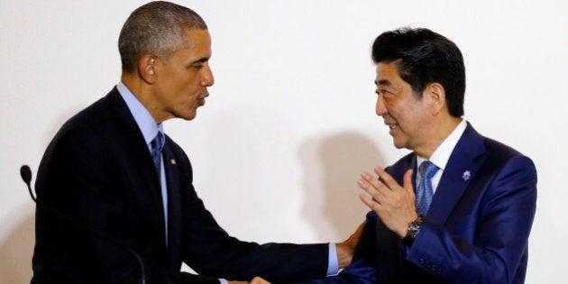 U.S. President Barack Obama shakes hands with Japan's Prime Minister Shinzo Abe during a press conference after a bilateral meeting during the 2016 Ise-Shima G7 Summit in Shima, Japan May 25, 2016. REUTERS/Carlos Barria