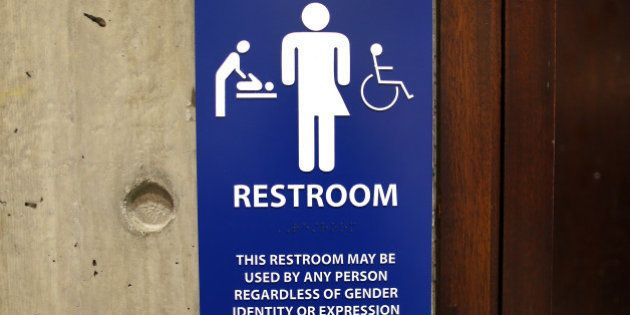 BOSTON, MA - MAY 25: The sign for the gender-neutral bathrooms on the 5th floor of Boston City Hall across from the reception area for the Mayor's office, May 15, 2016. The answer to the question of what restroom signs should say is not clear as transgender activists fight to use the facility that matches their identity. (Photo by John Tlumacki/The Boston Globe via Getty Images)