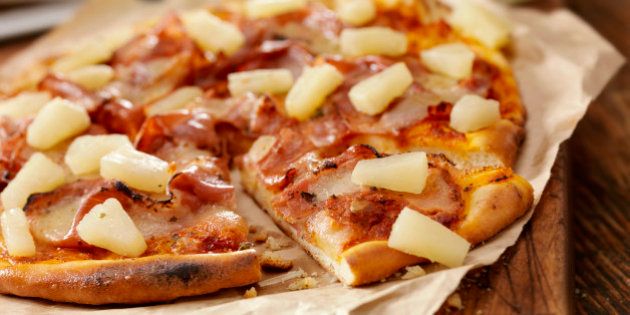 'Authentic Italian, Hand Made Ham and Pineapple Pizza with Fresh Mozzarella - Photographed on a Hasselblad H3D11-39 megapixel Camera System'
