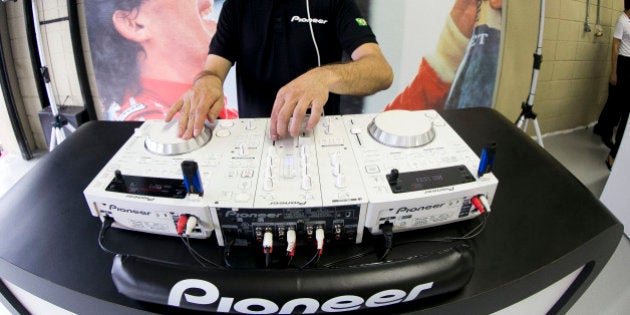 SAO PAULO, BRAZIL - DECEMBER 01: Pioneer Dj during the Ayrton Senna Racing Day - Relay Marathon at the Autodromo Jose Carlos Pace-Interlagos on December 01, 2013 in Sao Paulo, Brazil. (Photo by Daniel Vorley/Getty Images)