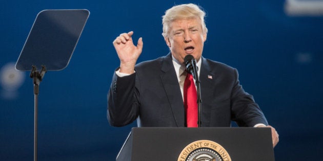 NORTH CHARLESTON, SC - FEBRUARY 17: U.S. President Donald Trump addresses a crowd during the debut event for the Dreamliner 787-10 at Boeing's South Carolina facilities on February 17, 2017 in North Charleston, South Carolina. The airplane begins flight testing later this year and will be delivered to airline customers starting in 2018. (Photo by Sean Rayford/Getty Images)