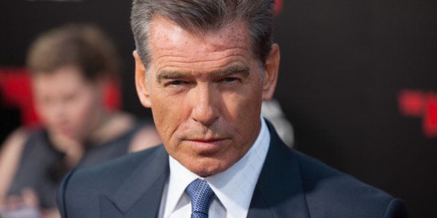 HOLLYWOOD, CA - AUGUST 13: Pierce Brosnan arrives for the Premiere Of Relativity Media's 'The November Man' - Arrivals at TCL Chinese Theatre on August 13, 2014 in Hollywood, California. (Photo by Gabriel Olsen/Getty Images)