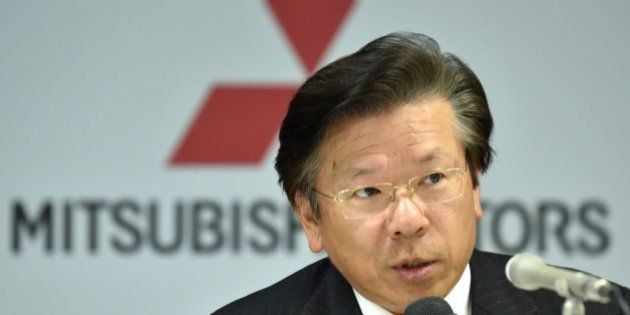 Japan's Mitsubishi Motors Corporation (MMC) President and Chief Operating Officer Tetsuro Aikawa answers questions during a press conference to announce their financial results for the fiscal year 2014 (ending March 31, 2015) at the company's headquarters in Tokyo on April 24, 2015. Global retail sales volume for the full 2014 fiscal year totaled 1,090,000 units, and increase 4% or 43,000 units over the same period in FY2013, MMC said. AFP PHOTO / KAZUHIRO NOGI (Photo credit should read KAZUHIRO NOGI/AFP/Getty Images)