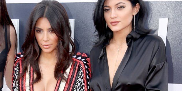 Kendall Jenner, and from left, Kim Kardashian, and Kylie Jenner arrive at the MTV Video Music Awards at The Forum on Sunday, Aug. 24, 2014, in Inglewood, Calif. (Photo by Matt Sayles/Invision/AP)