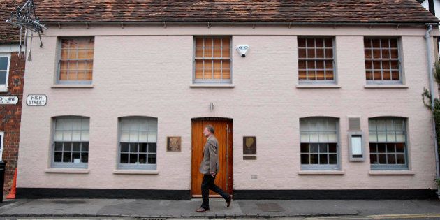 UNITED KINGDOM - NOVEMBER 09: A pedestrian passes the Fat Duck restaurant in Bray, Berkshire, U.K., on Friday, Nov. 9, 2007. Heston Blumenthal is the chef-owner of Fat Duck. (Photo by Carl Court/Bloomberg via Getty Images)