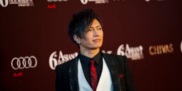 HONG KONG - MARCH 19: Japanese singer and actor Gackt poses at the red carpet during the 6th Asian Film Awards, celebrating excellence in cinema, at Hong Kong Convention and Exhibition Center on 19 March 2012 in Hong Kong, China The event honours specifically filmmakers achievements in the field of Asian cinema, bringing together the best cinematic talent in Asia. (Photo by Victor Fraile/Getty Images)