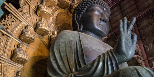 NARA, JAPAN - 2014/05/20: Great Buddha at Daibutsuden, Todaiji - Todai-ji or the Eastern Great Temple in Nara - the Great Buddha Hall Daibutsuden shelters the world's largest bronze statue of the Buddha known in Japanese as Daibutsu. The temple is a listed UNESCO World Heritage Site as 'Historic Monuments of Ancient Nara. Wild deer, regarded as messengers of the gods in the Shinto religion, roam the area regularly. (Photo by John S Lander/LightRocket via Getty Images)