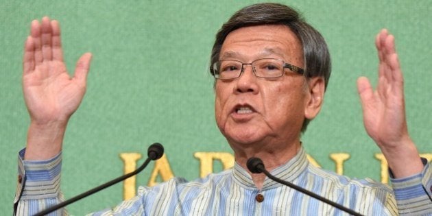 Okinawa Governor Takeshi Onaga delivers a speech at the Japan National Press Club in Tokyo on May 20, 2015 after spearheading a rally during the weekend in protest against a controversial US airbase on the island. Onaga will visit to the US at the end of May to talk about US bases in Okinawa. AFP PHOTO / Toru YAMANAKA (Photo credit should read TORU YAMANAKA/AFP/Getty Images)