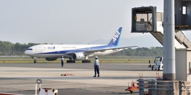 An ANA passenger jet plane arrives at Kumamoto airport, which has been closed by the earthquake, on April 19, 2016. More than 500 earthquakes have rocked Kumamoto and other parts of central Kyushu since April 14, stoking fears that houses not damaged in the two major quakes could yet be affected. / AFP / KAZUHIRO NOGI (Photo credit should read KAZUHIRO NOGI/AFP/Getty Images)