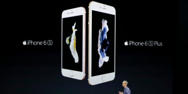 Apple CEO Tim Cook discusses the new iPhone 6s and iPhone 6s Plus during the Apple event at the Bill Graham Civic Auditorium in San Francisco, Wednesday, Sept. 9, 2015. (AP Photo/Eric Risberg)