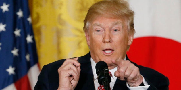 U.S. President Donald Trump gestures as he holds a joint press conference with Japanese Prime Minister Shinzo Abe (not pictured) at the White House in Washington, U.S., February 10, 2017. REUTERS/Jim Bourg