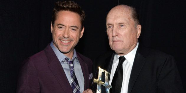 HOLLYWOOD, CA - NOVEMBER 14: Actors Robert Downey Jr. (L) and Robert Duvall pose with the Hollywood Supporting Actor Award for 'The Judge' backstage during the 18th Annual Hollywood Film Awards at The Palladium on November 14, 2014 in Hollywood, California. (Photo by Kevin Mazur/WireImage)