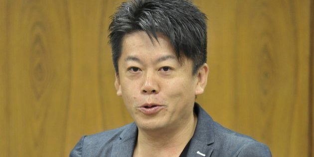 衆院法務委員会で、参考人として意見を陳述する元ライブドア社長の堀江貴文氏（2015年7月10日撮影）