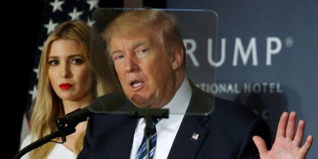 Republican presidential nominee Donald Trump and his daughter Ivanka Trump attend a campaign event in Washington, DC, U.S., October 26, 2016. REUTERS/Carlo Allegri