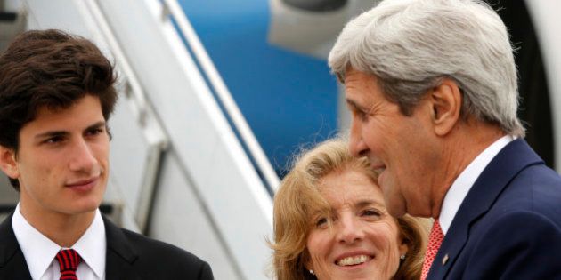 US Ambassador to Japan Caroline Kennedy (C) and her son Jack Schlossberg (L) greet US Secretary of State John Kerry (R) upon his arrival at Iwakuni Marine Corps Air Station in Iwakuni on April 10, 2016.Kerry arrived in Japan on April 10 for a Group of Seven meeting in Hiroshima, marking the first-ever visit to the atomic-bombed city by a US secretary of state. / AFP / POOL / JONATHAN ERNST (Photo credit should read JONATHAN ERNST/AFP/Getty Images)