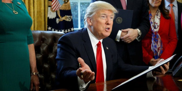 U.S. President Donald Trump speaks before signing an executive order rolling back regulations from the 2010 Dodd-Frank law on Wall Street reform at the White House in Washington February 3, 2017. REUTERS/Kevin Lamarque