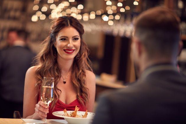 Couple celebrate Valentine's day with romantic dinner in restaurant