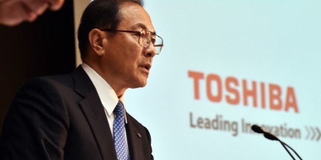 Japan's troubled electronics giant Toshiba president Masashi Muromachi announces the new management of the company at Toshiba's headquarters in Tokyo on August 18, 2015. Crisis-hit Toshiba said it will book a net loss for the last fiscal year, as it scrambles to revise its financial records to account for a billion dollar accounting scandal. The company also announced that it would appoint a host of renowned Japanese business people as outside directors in a management overhaul to improve its corporate culture, in which high-handed bosses routinely pressured their subordinates to inflate profits. AFP PHOTO / Yoshikazu TSUNO (Photo credit should read YOSHIKAZU TSUNO/AFP/Getty Images)