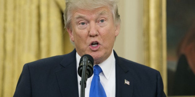 U.S. President Donald Trump speaks before the swearing-in ceremony of Rex Tillerson, U.S. Secretary of State for President Donald Trump, not pictured, in the Oval Office of the White House in Washington, D.C., U.S., on Wednesday, Feb. 1, 2017. Tillerson won Senate confirmation as secretary of state after lawmakers split mostly along party lines on President Trump's choice of an oilman with no government experience but a career negotiating billions of dollars of energy deals worldwide. Photographer: Michael Reynolds/Pool via Bloomberg