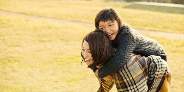 Mother and daughter having fun time in outdoors