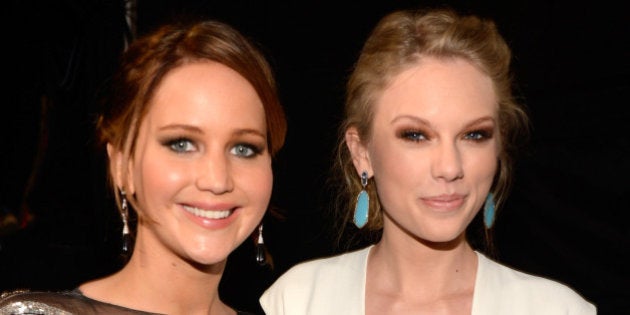 LOS ANGELES, CA - JANUARY 09: Jennifer Lawrence and Taylor Swift backstage during 2013 People's Choice Awards at Nokia Theatre L.A. Live on January 9, 2013 in Los Angeles, California. (Photo by Kevin Mazur/WireImage)