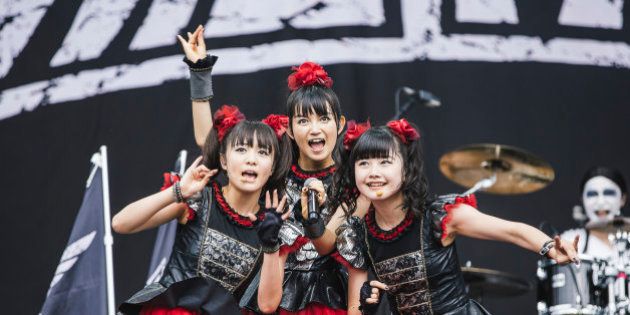 LEEDS, ENGLAND - AUGUST 30: (L-R) Moametal, Su-metal and Yuimetal of Babymetal perform on the main stage during day 3 of Leeds Festival at Bramham Park on August 30, 2015 in Leeds, England. (Photo by Andrew Benge/Redferns)