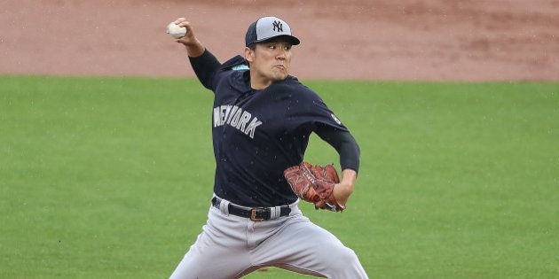 CLEARWATER, FL - MARCH 29: Masahiro Tanaka #19 of the New York Yankees pitches during the second inning of the Spring Training Game against the Philadelphia Phillies on March 29, 2016 at Bright House Field, Clearwater, Florida. (Photo by Leon Halip/Getty Images)