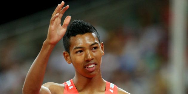 BEIJING, CHINA - AUGUST 25: Abdul Hakim Sani Brown of Japan reacts after competing in the Men's 200 metres heats during day four of the 15th IAAF World Athletics Championships Beijing 2015 at Beijing National Stadium on August 25, 2015 in Beijing, China. (Photo by Alexander Hassenstein/Getty Images for IAAF)
