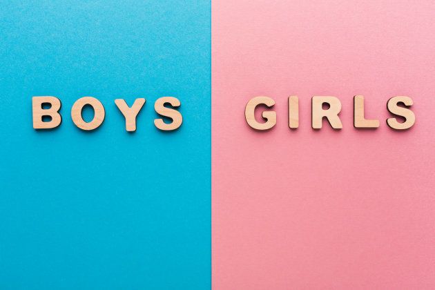Words Boys and Girls on bright backgrounds. Unknown baby gender, uncertainty and doubt concept