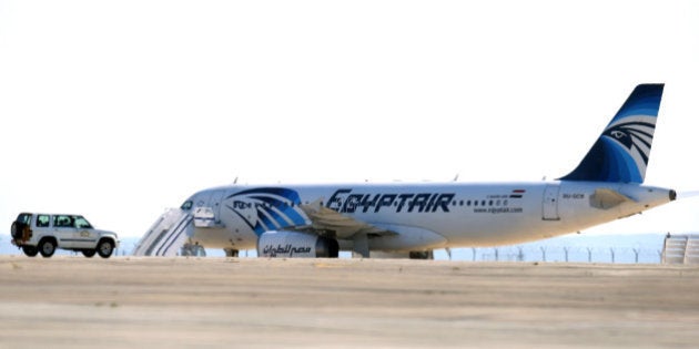 An EgyptAir Airbus A-320 sits on the tarmac of Larnaca airport after it was hijacked and diverted to Cyprus on March 29, 2016. A hijacker seized the Egyptian airliner and diverted it to Cyprus, before releasing all the passengers except four foreigners and the crew, officials and the airline said. / AFP / GEORGE MICHAEL (Photo credit should read GEORGE MICHAEL/AFP/Getty Images)